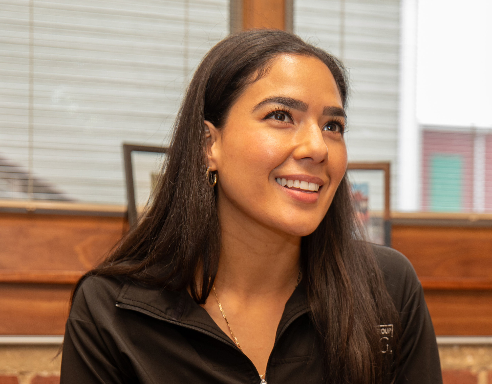 Team member smiling